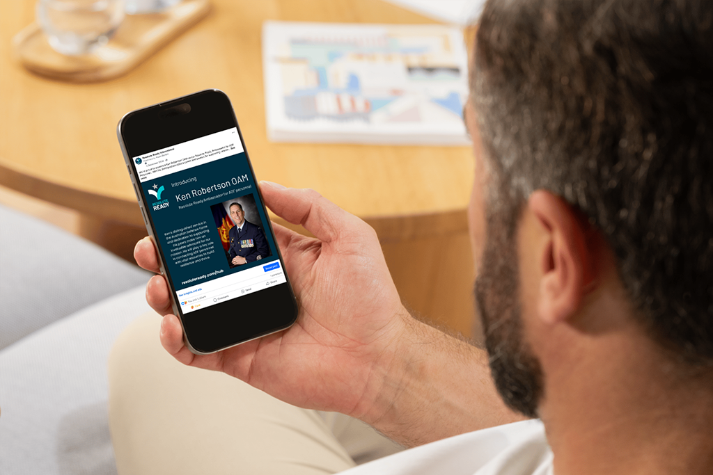 man looking at phone