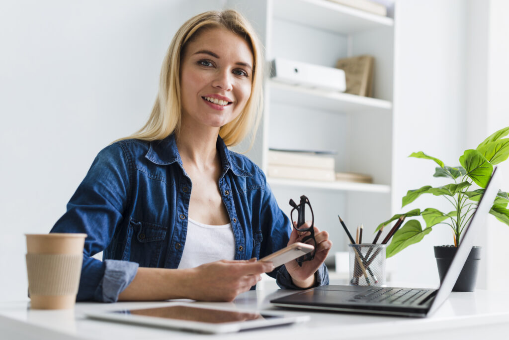 woman at desk with laptop